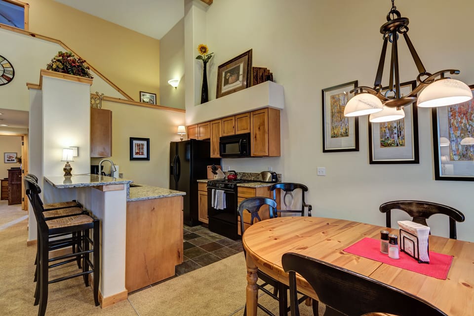 Dining room and kitchen are adjacent to the living room