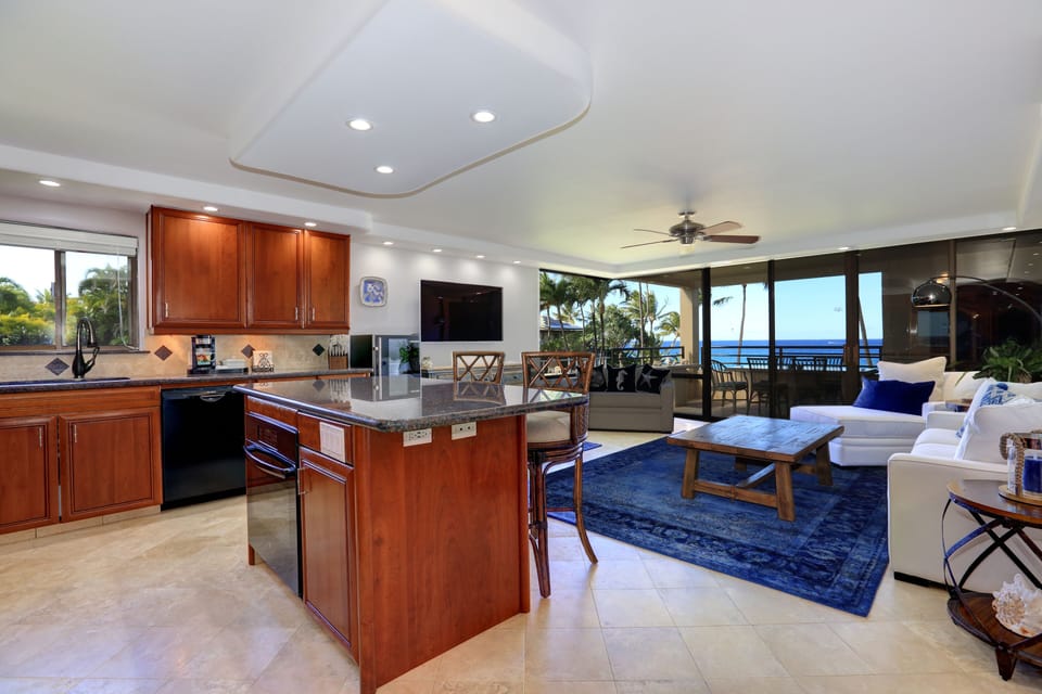 Kitchen and Living Room | View of the ocean can be seen from the lanai