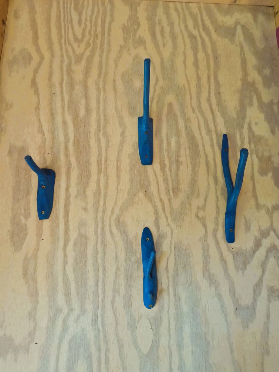 Unique touches throughout. Hooks hand-crafted from branches