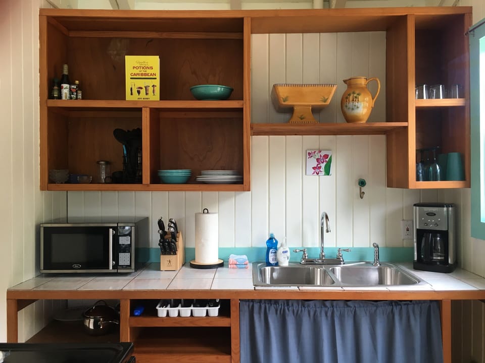 Well-equipped kitchen  (toaster, blender, pots/pans, etc. stored below)