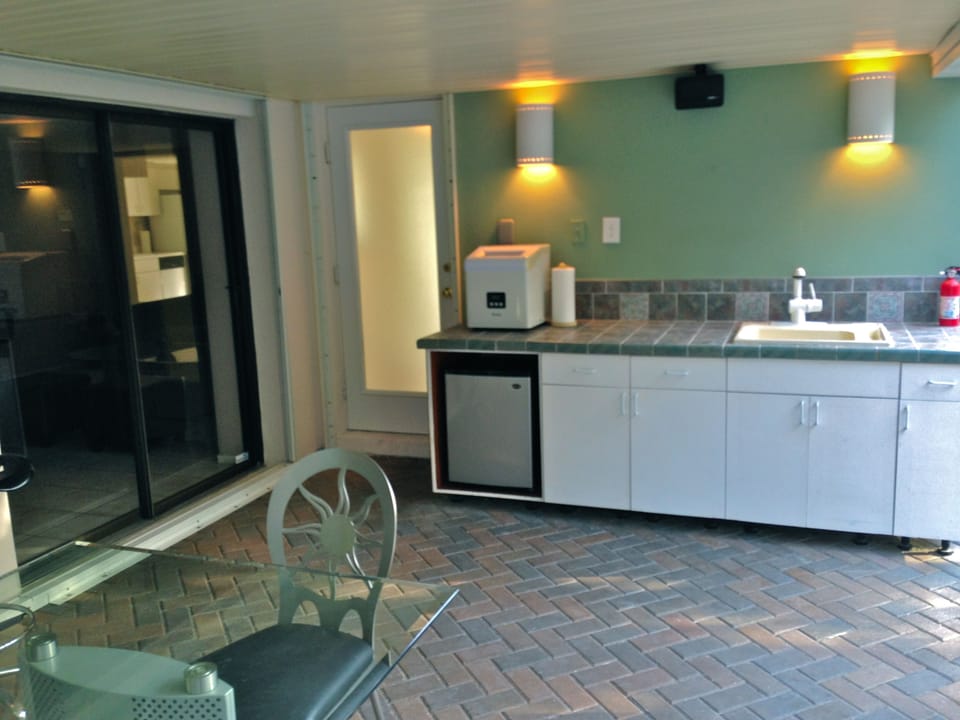 The door you see is a bathroom so drink all you want, it's not far from the pool and bar.