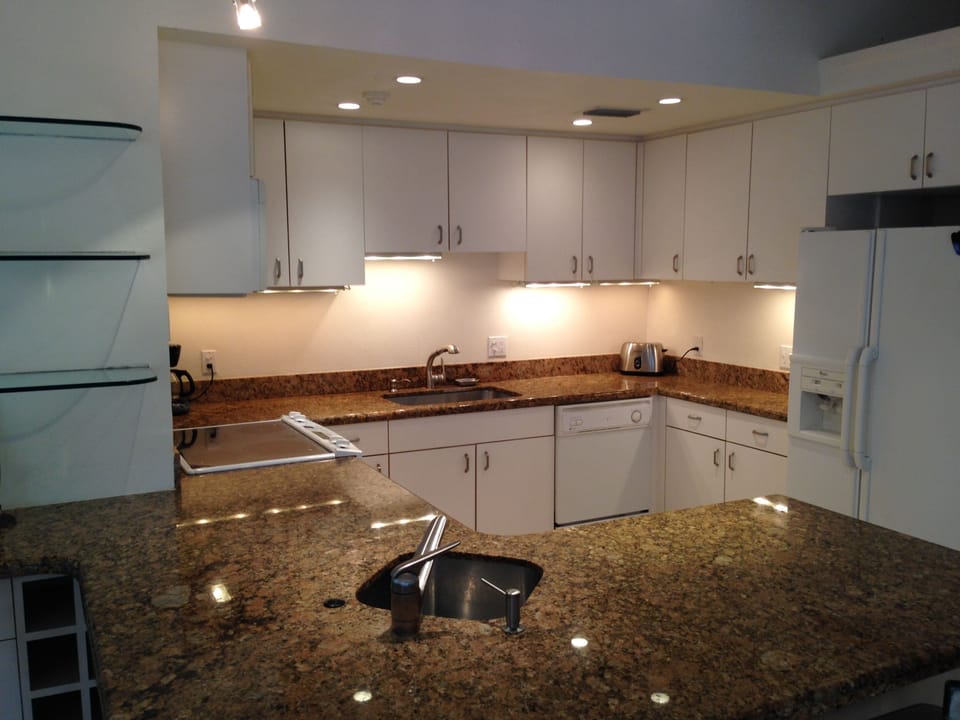 Close-up of the upstairs kitchen and wet bar.