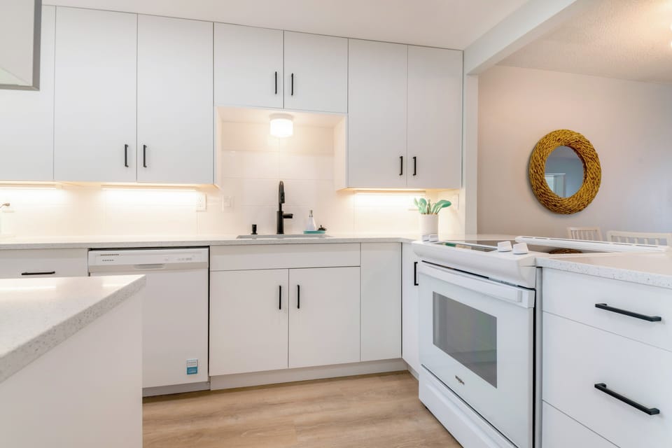 Renovated 2025. Kitchen entrance.  Spacious with tons of storage space.