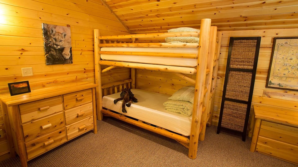 Our new twin bunk bed, dresser and privacy screen, added to the loft in 2016.