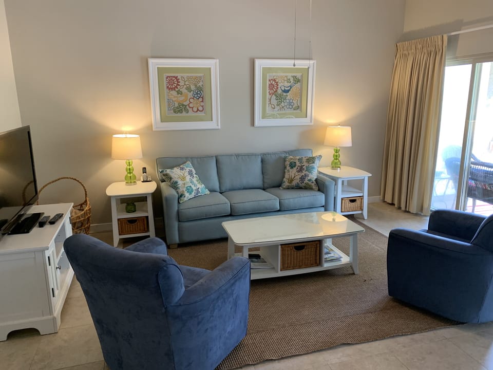 The Family Room is bright and comfortable with a new couch in 2019!