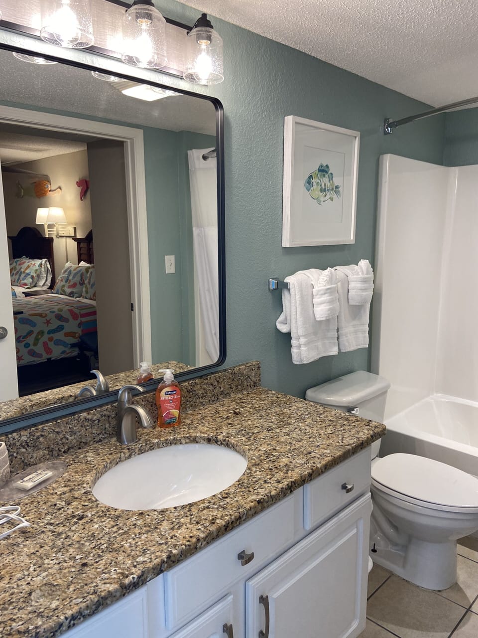 Jack-N-Jill bath in hallway is shared by the "Mermaid" and "Surf” rooms.