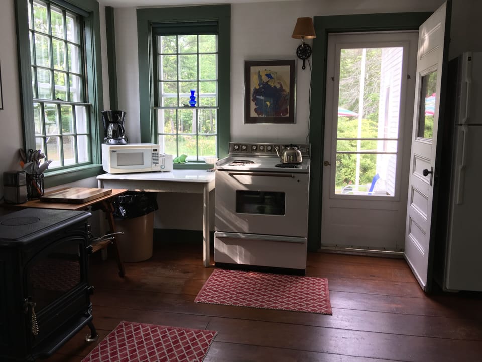 Enter from the side door, into the kitchen
