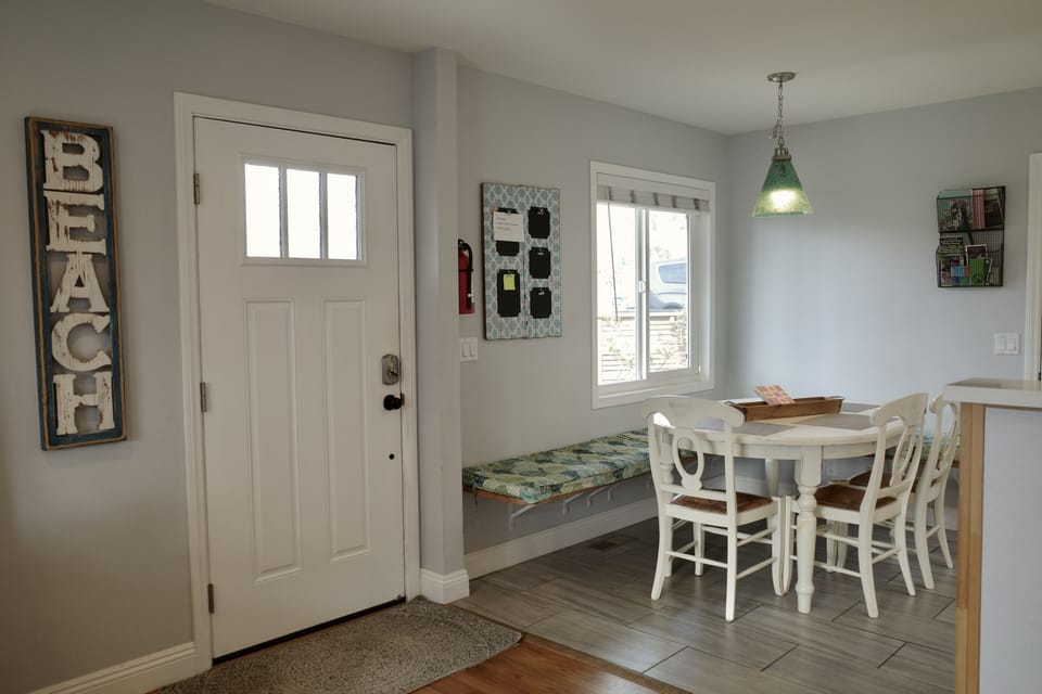 The front door opens to the fully fenced patio. 