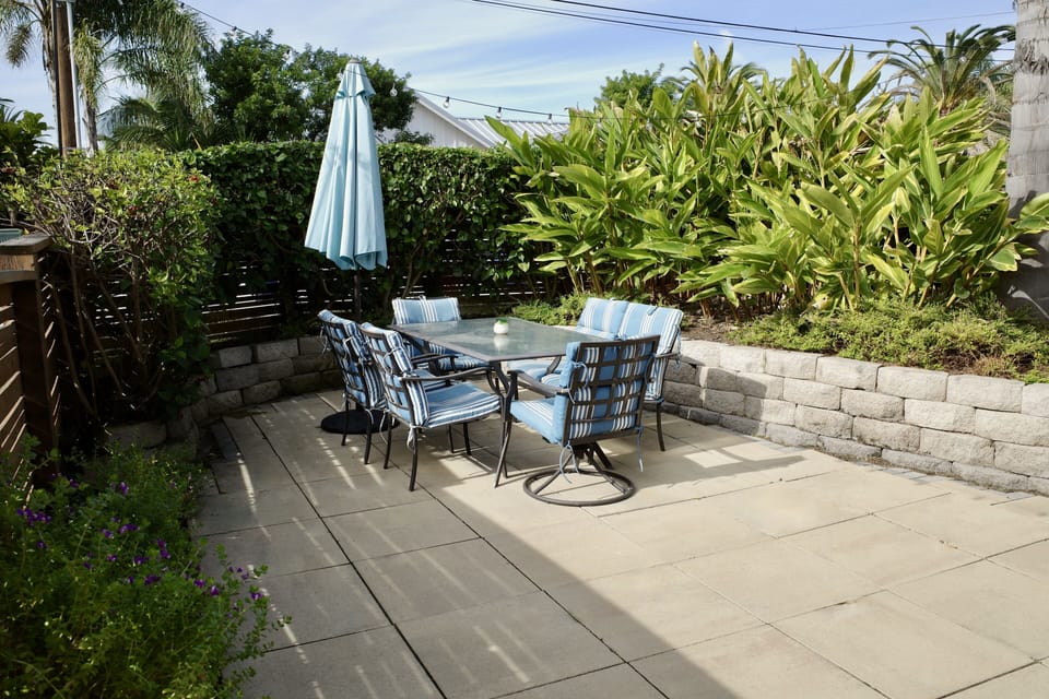 Fully fenced front patio with lush landscaping!
