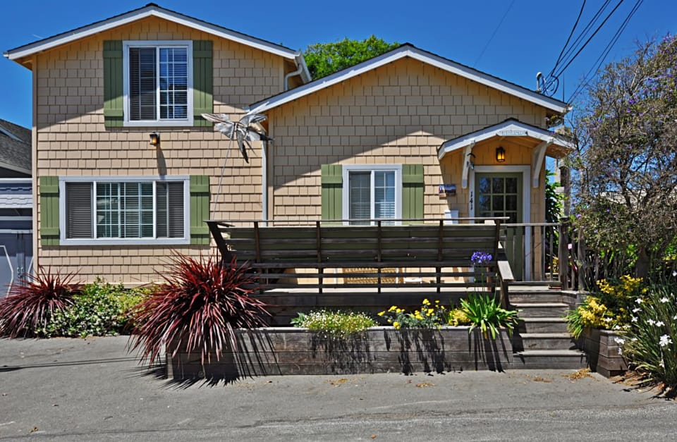 The front of our home has nice deck & benches. It overlooks the ocean on right.