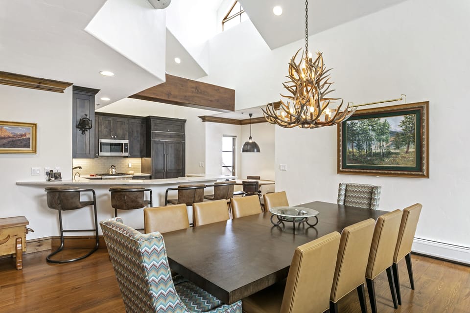 Dining table for 10, humanely sourced antler chandelier!