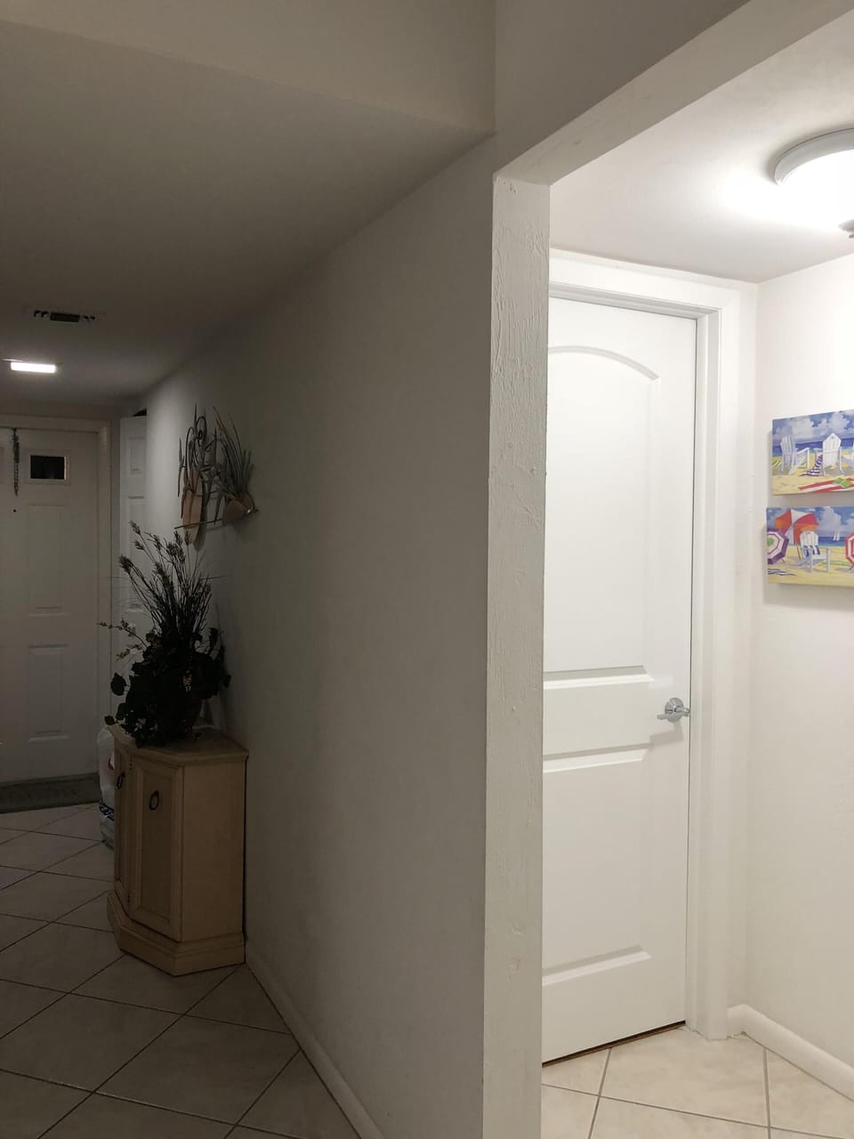 Hallway on left leads to second bedroom, bathroom and laundry room.