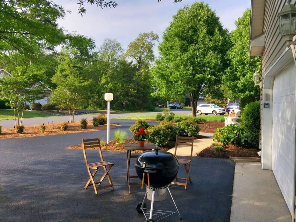 BBQ right outside garage; includes chairs, table and  Weber charcoal grill
