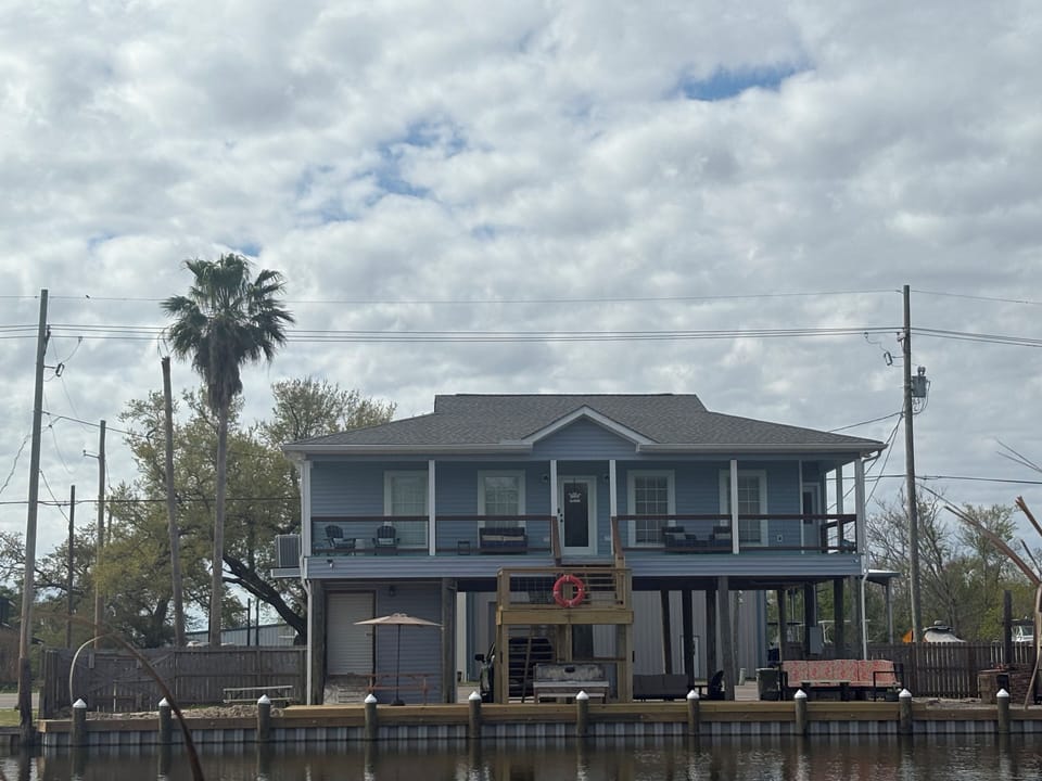 Porch and deck facing bayou