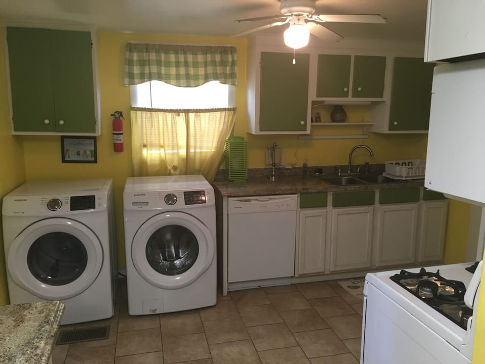New Samsung Washer / Dryer in kitchen.  We also include laundry soap!
