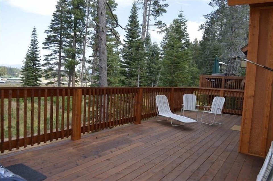 There's large back deck!  Great for sunbathing or snow play -  enjoy it all year