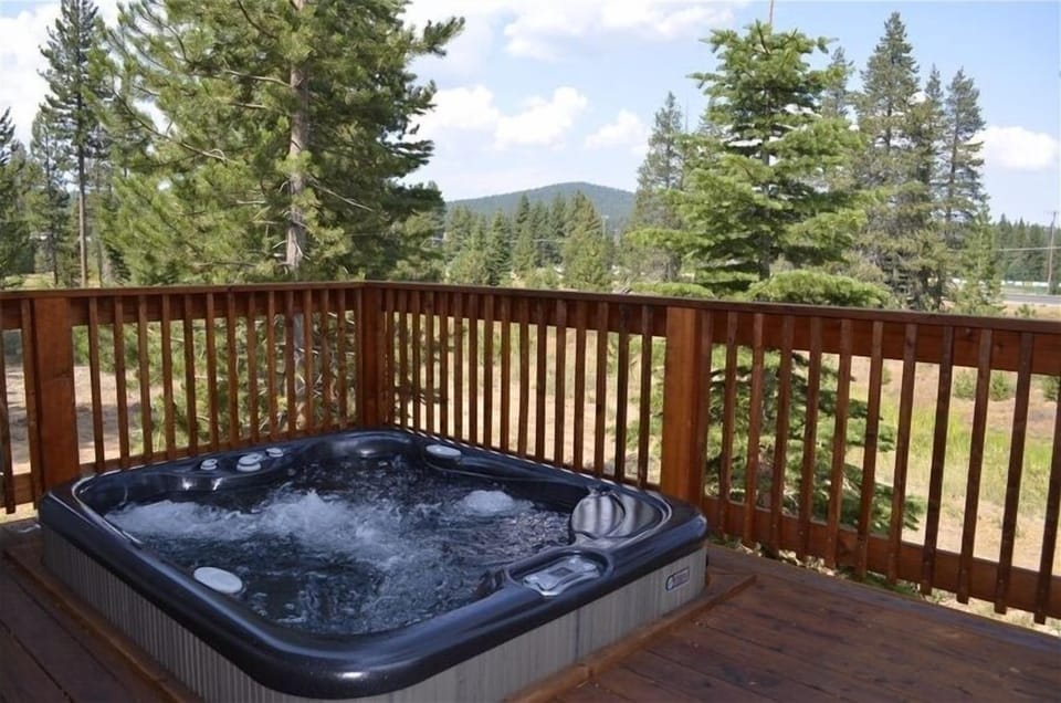 Hot tub on the back deck - perfect place for 4-6 people to relax
