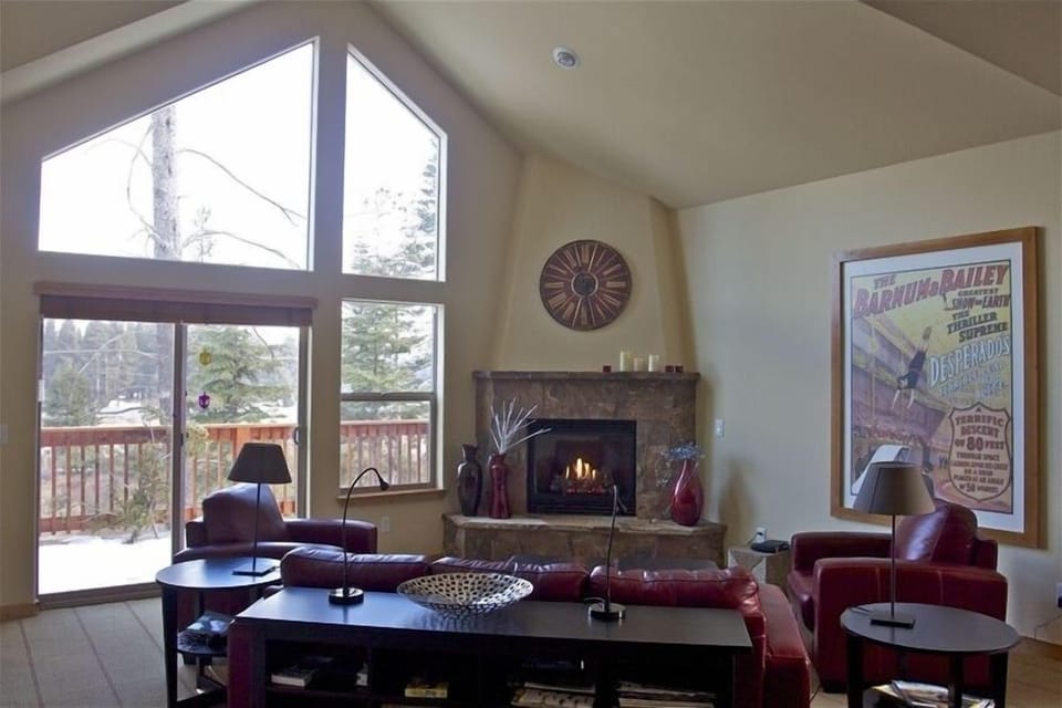Cozy up around the fire and enjoy the view!  Comfortable new leather couches!