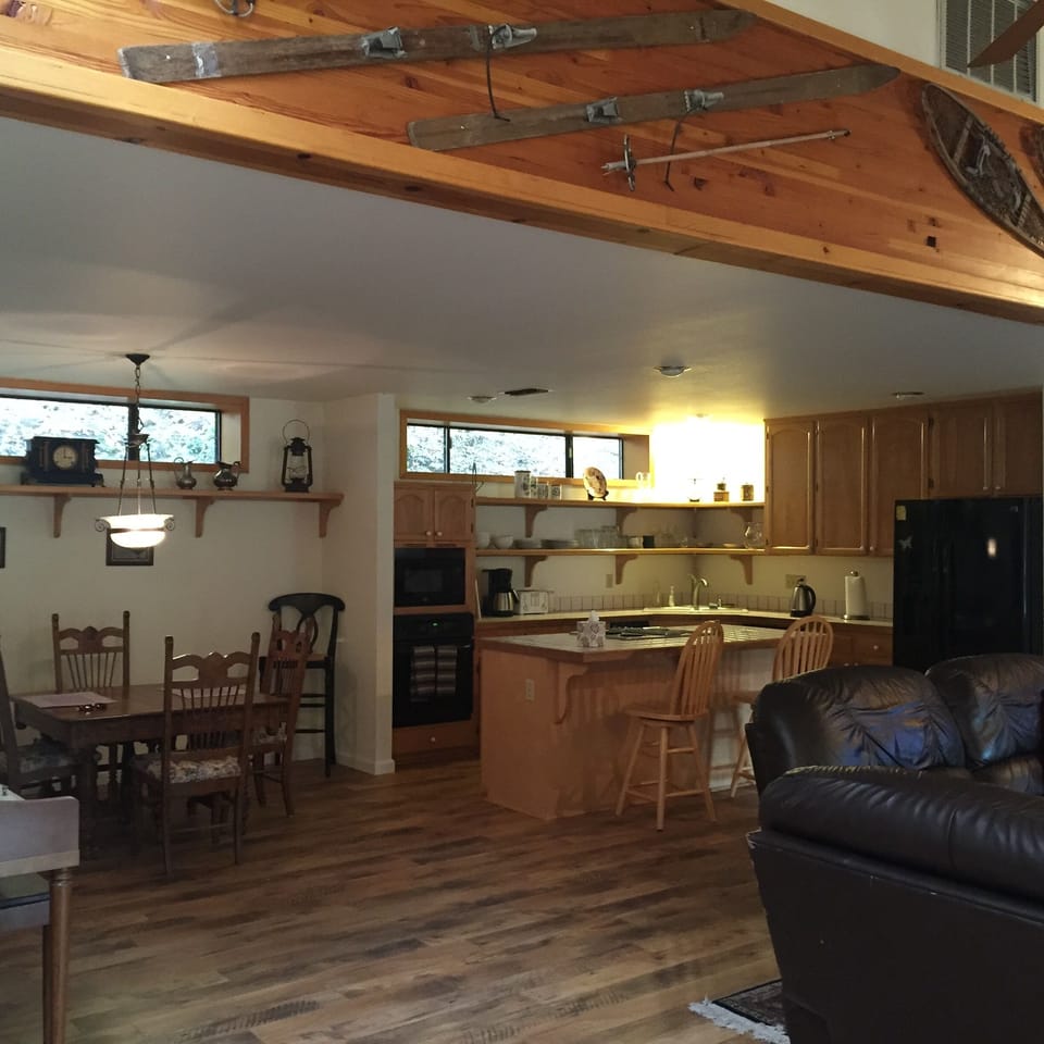 Kitchen, dining, living area from entry