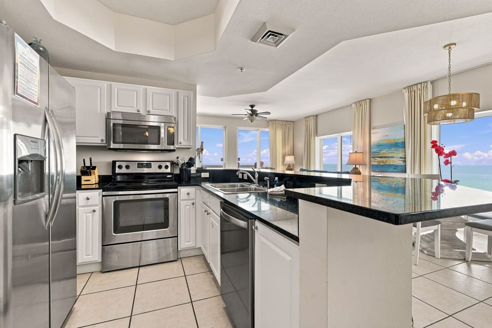 BRAND NEW lighting updates throughout kitchen & living area