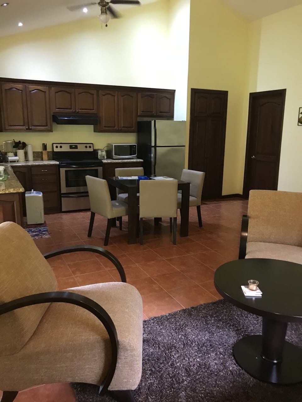 Kitchen, dining and living room of inside of villa.  All comforts of home.