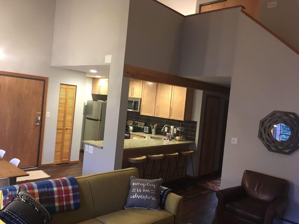 Living room looking back into the updated kitchen.