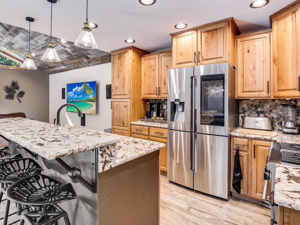 Stunning kitchen with bar top seating area