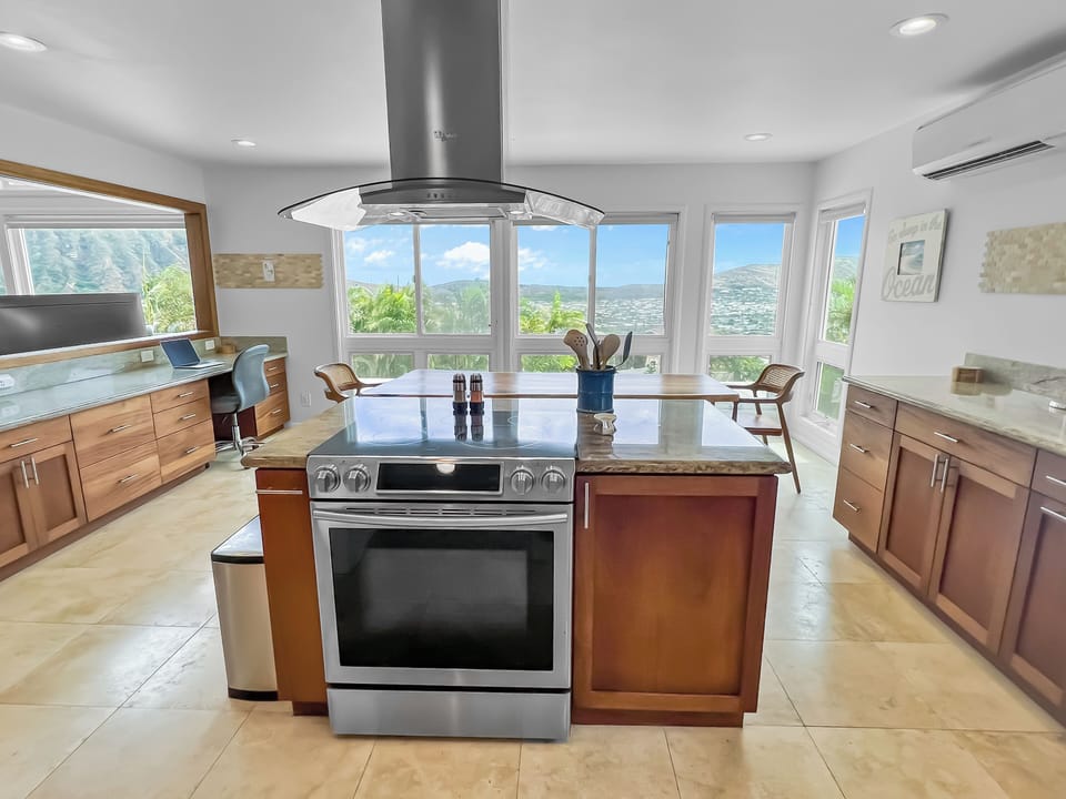 Conveniently prepare your meals in the kitchen with a view!