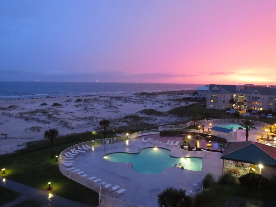 Sunset view of the beach and gulf from balcony of 5408