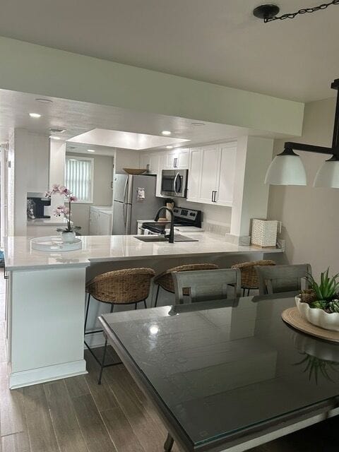Kitchen with full laundry