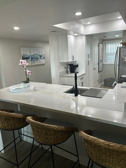 Facing kitchen and ground floor entry.