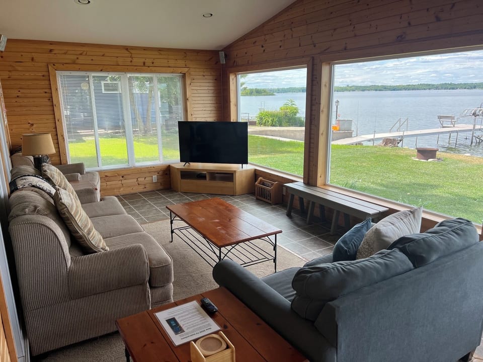 Incredible views and natural light pouring into the lakeside living room