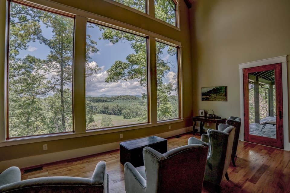 Seating area in front of large windows