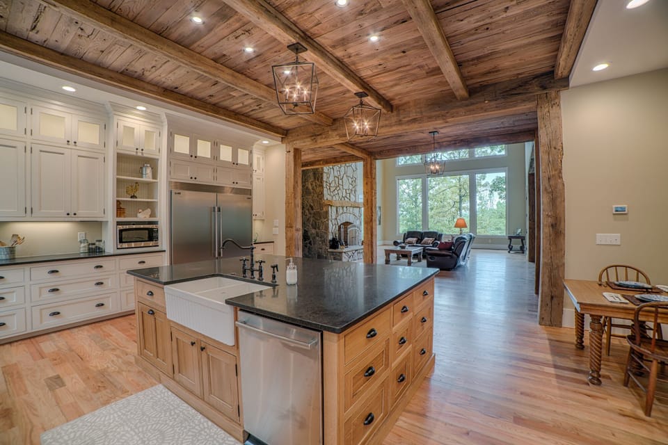 Gorgeous kitchen with farm sink, stainless steel appliances &  granite counters