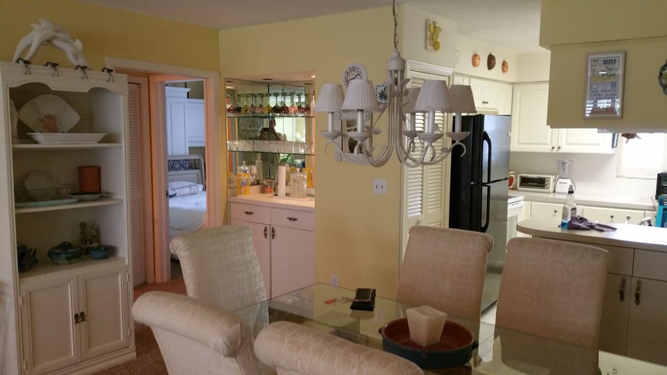 Dining room into kitchen and 2nd bedroom.