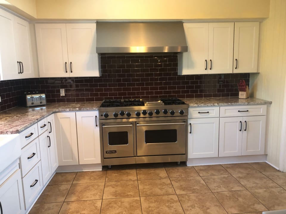 Lots of granite counter space, with marble on Island.
