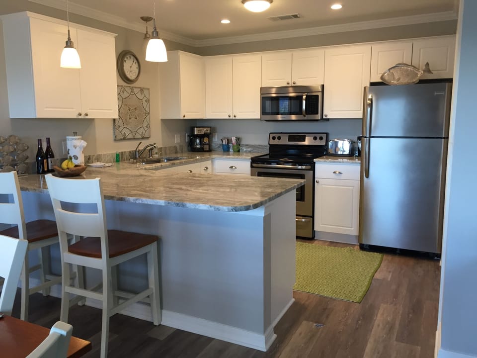 Kitchen, full supply of utensils and dishes. Dishwasher