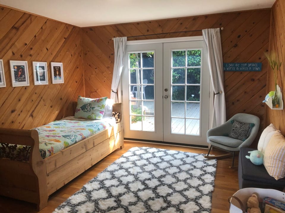 Kids space with french doors to outside patio