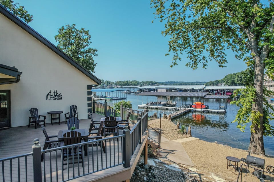 Expansive lake views from deck seating, perfect for dining or lounging.