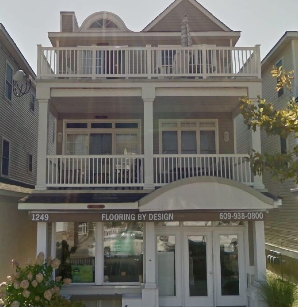 Enjoy an ice cold drink on the large deck of our beautiful top floor condo.