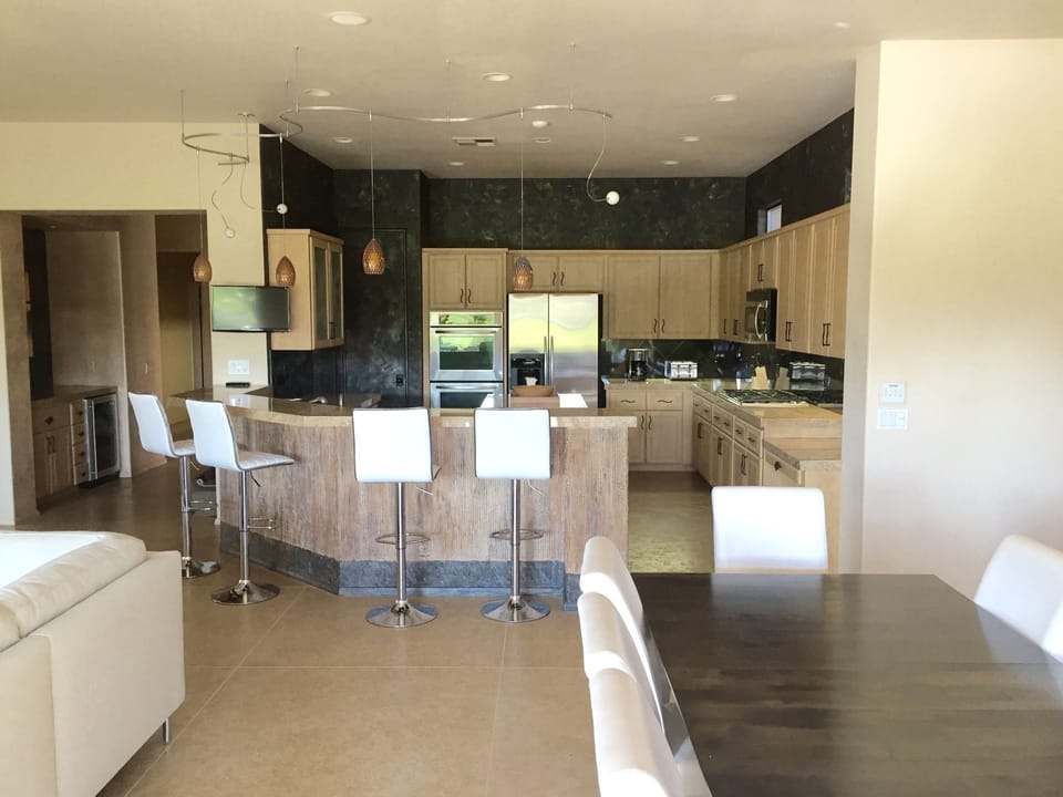 Just inside, enjoy the beautiful, newly furnished open floor plan.