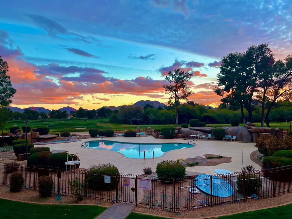  sunset over pool