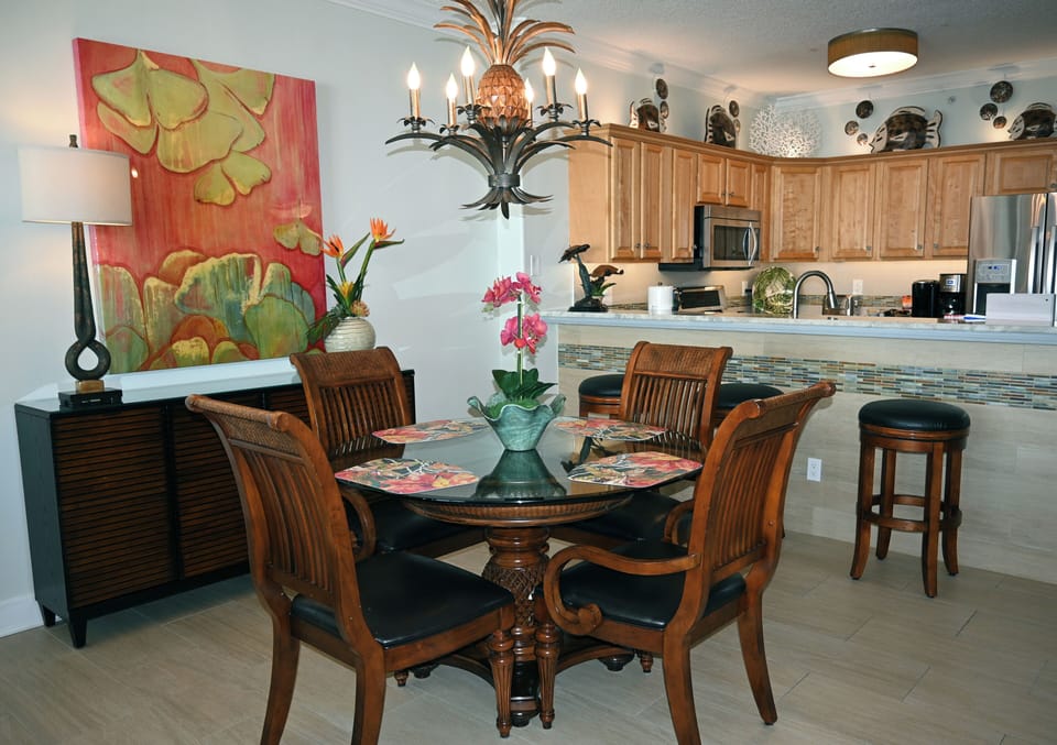 Dining space with barstools will seat up to 7 comfortably