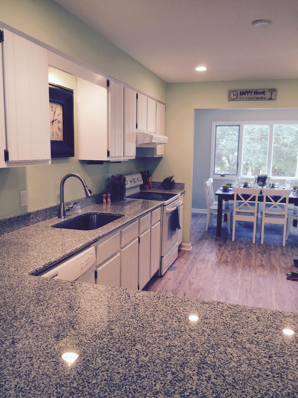 Kitchen, new floor, paint, lights, counters, etc