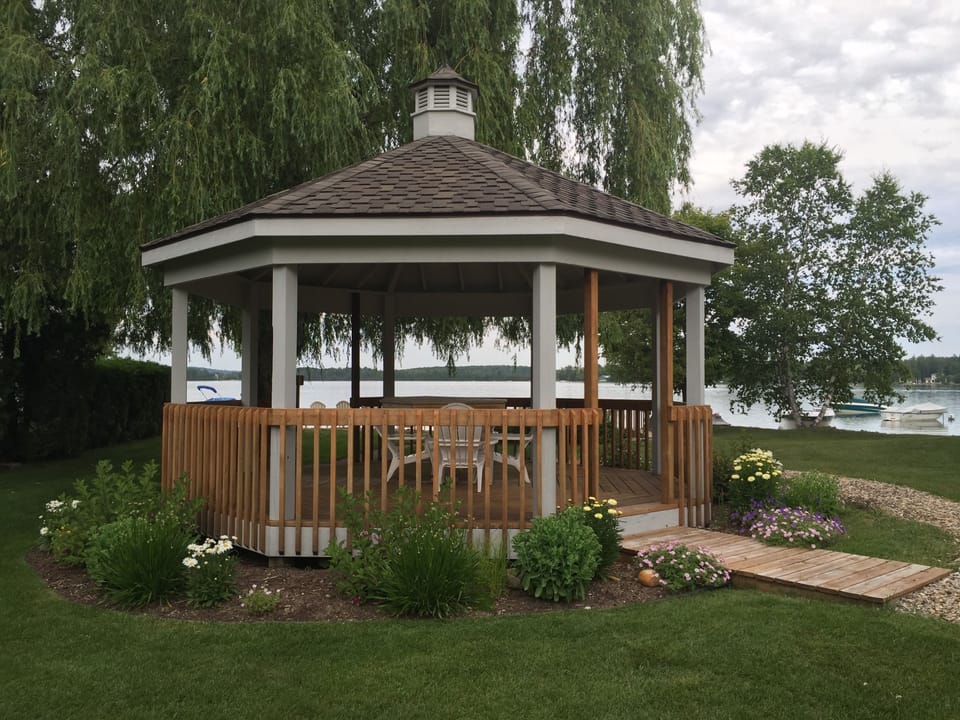 View of the gazebo on the left with the lake behind