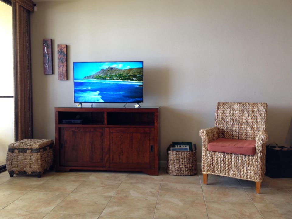 Entertainment center with Vizio 4k Ultra HD TV. Enjoy complimentary Netflix!