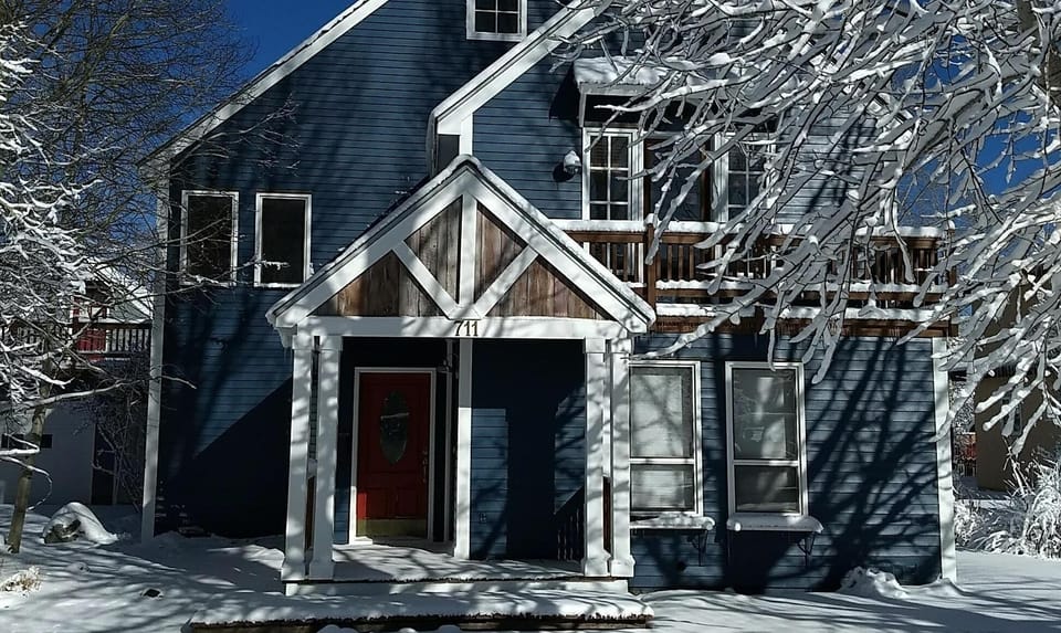 Our sweet blue house in winter.