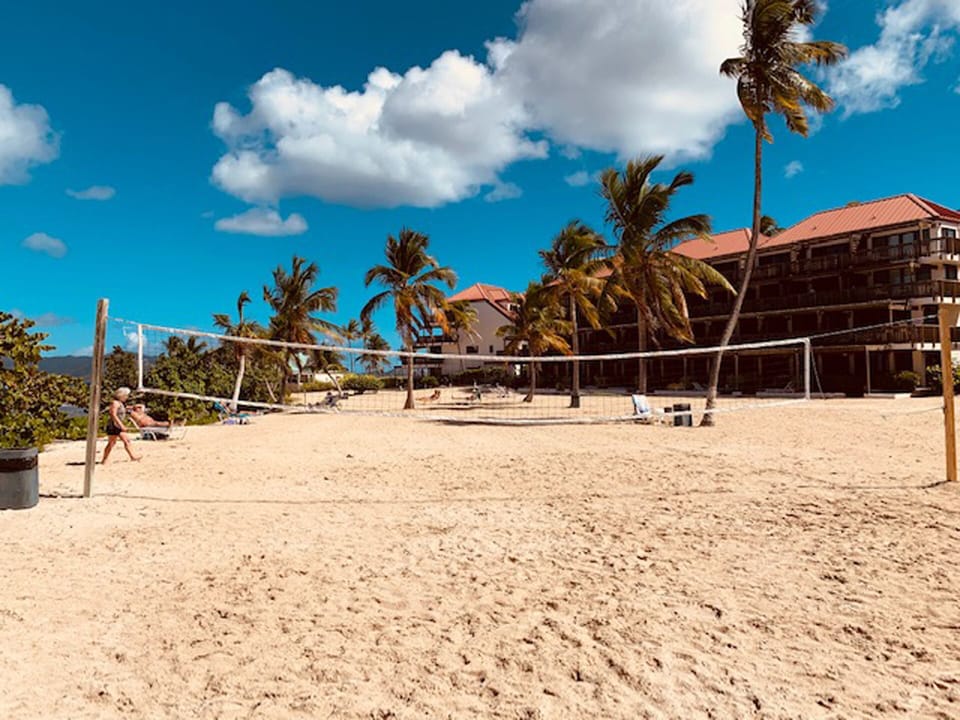 View of main Sapphire  Beach area with volley ball net. 