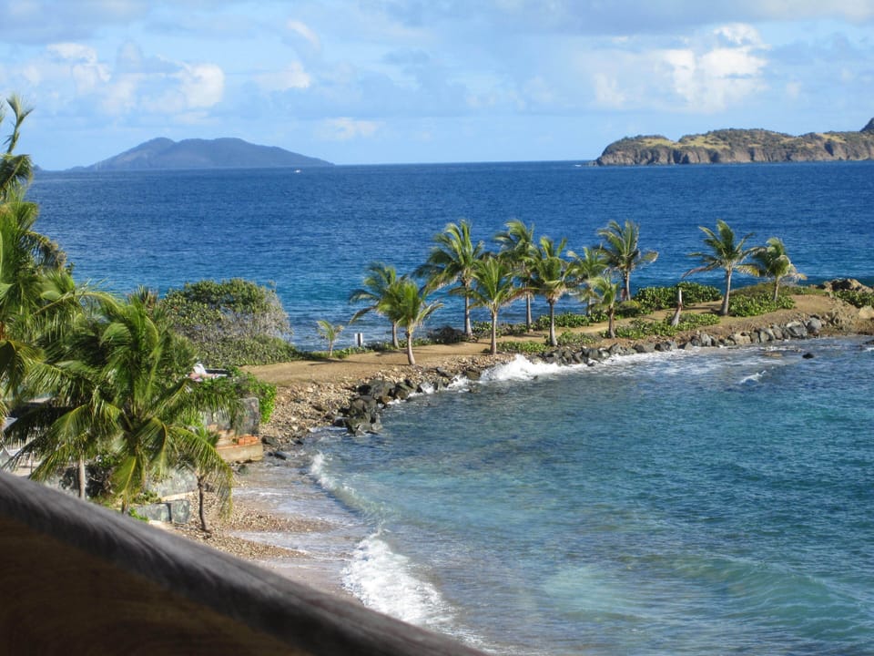 View from the 2nd floor lanai to the left toward the point of Sapphire Beach.