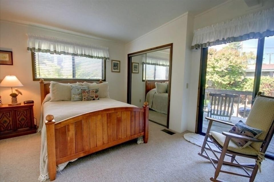 Main Level bedroom has its own deck & entry to backyard. 2nd bath is off hallway